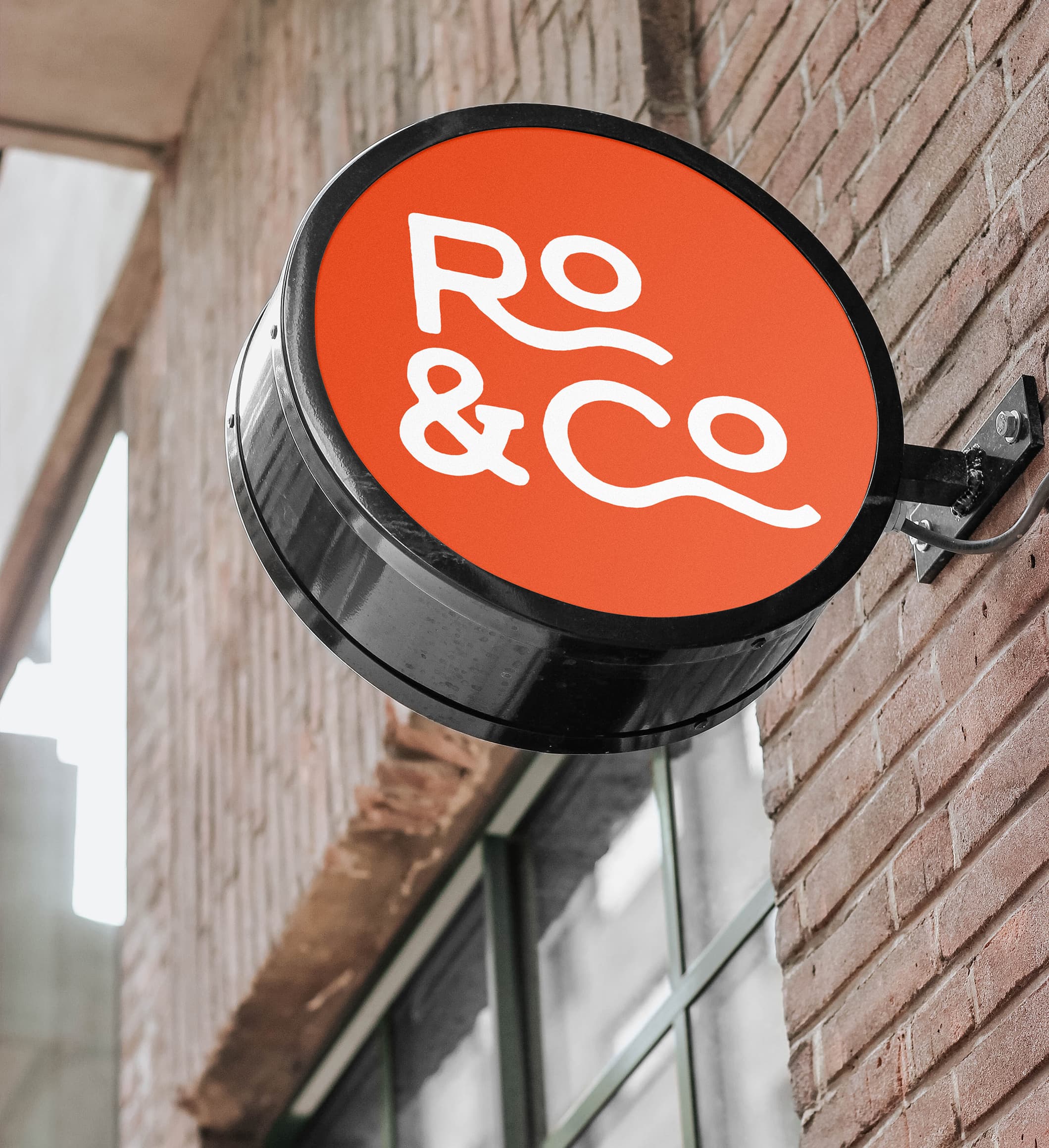 Ro & Co rounded sign